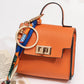 👛 PROMO FLASH 50 % ! 🌸 Porte-Monnaie Mini Porte-Clés Compact – Cuir PU Texturé, Fermoir Ton Or, Ruban Décoratif, 12 Couleurs 🏆